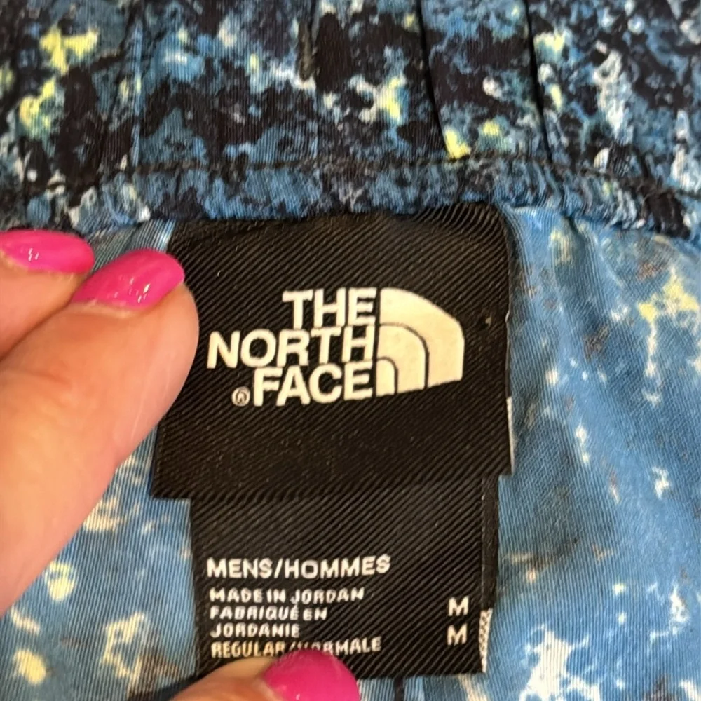 The North Face Blue and Yellow Athletic Shorts size medium‎